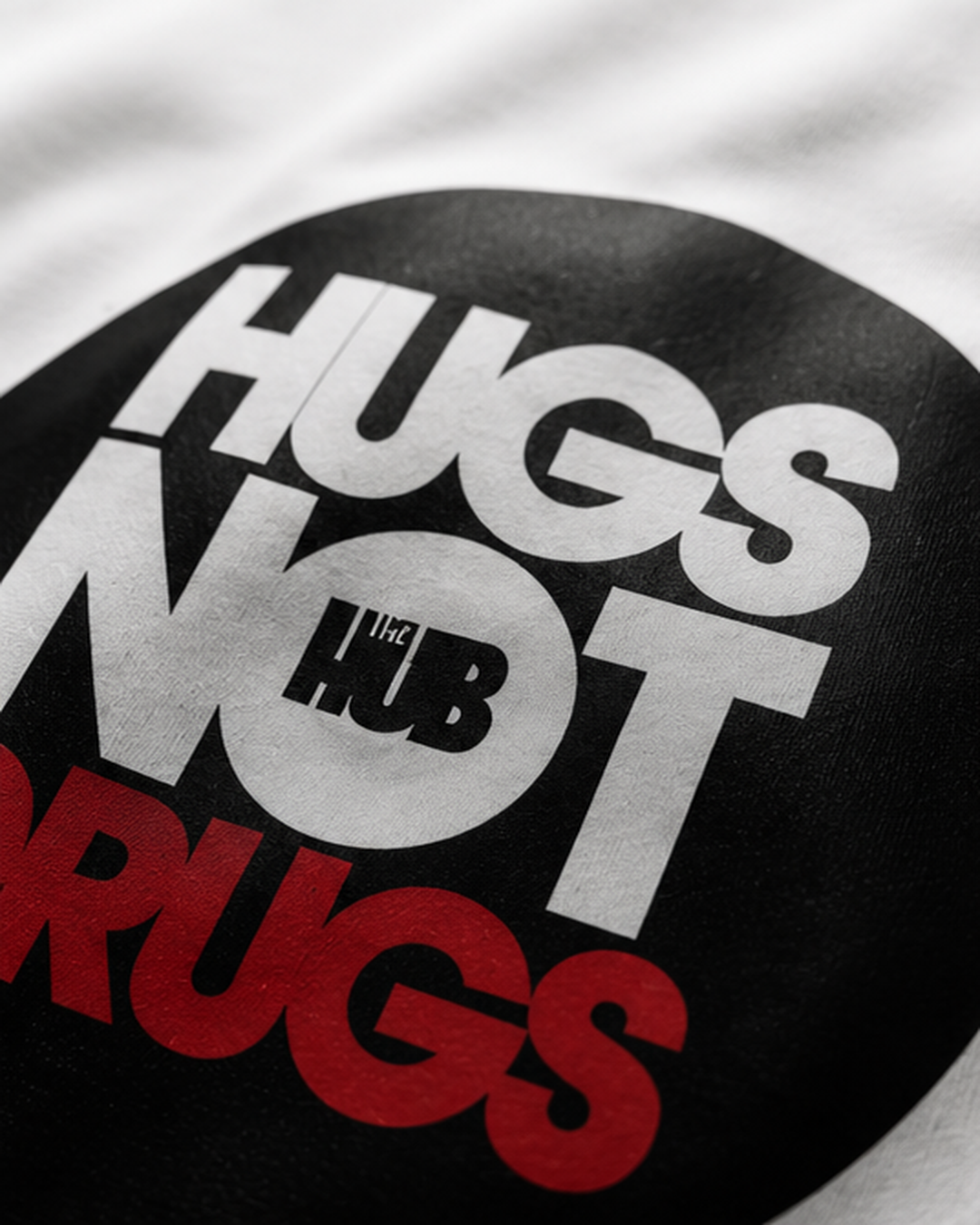 Projects Bakery x The HUB – Hugs Not Drugs Tee - Image 3