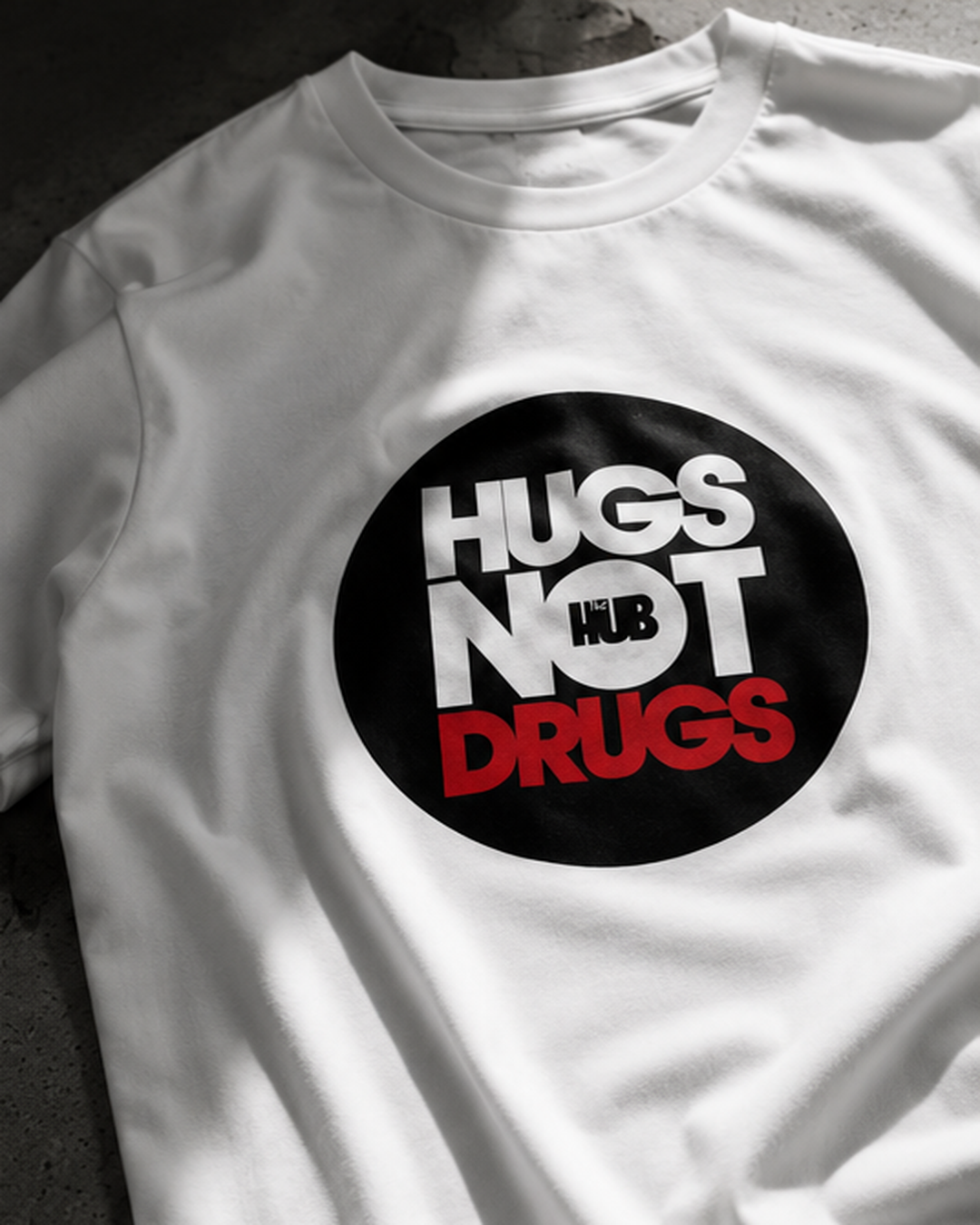 Projects Bakery x The HUB – Hugs Not Drugs Tee - Image 4